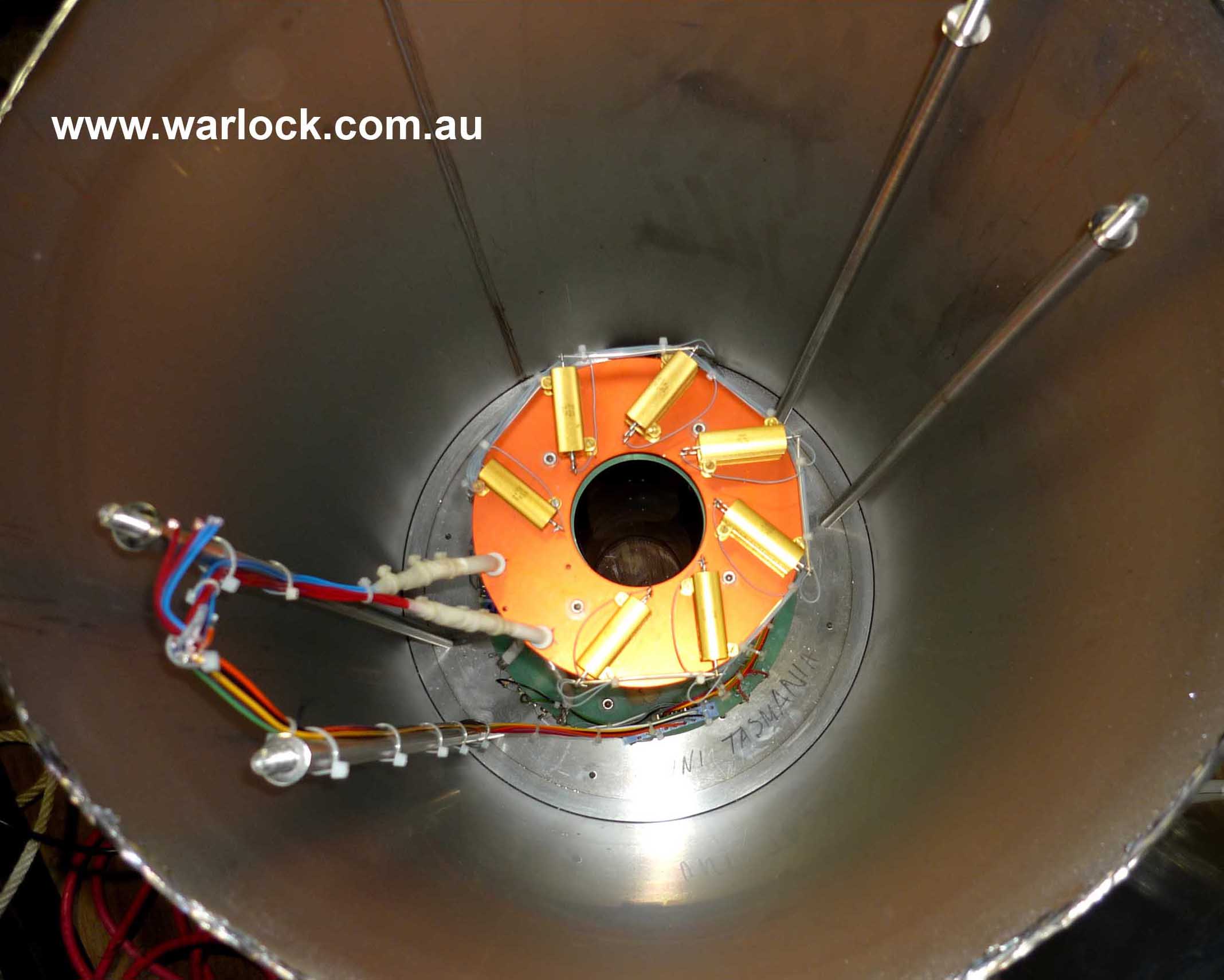 The superconducting magnet as viewed from the top of the helium vessel