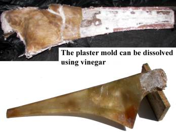 After 72 hr, pull both halves of the mold apart. If a plaster mold sticks shut, the plaster can be dissolved with dilute vinegar or hydrochloric acid.